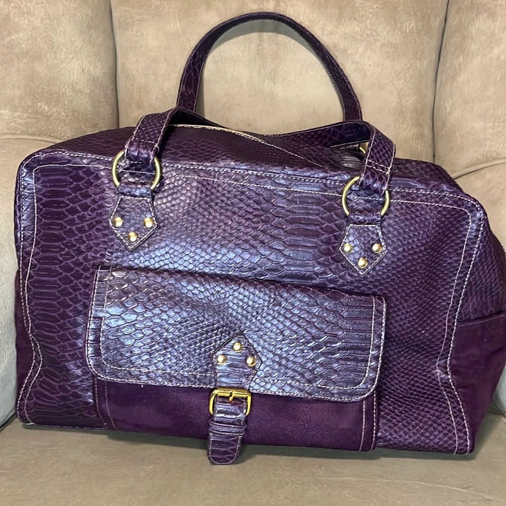Purple Elizabeth Arden bag